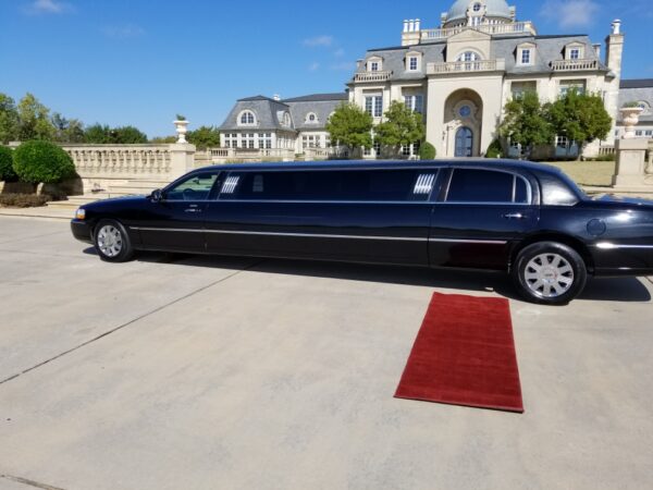 Wedding Limo Packages. The black Lincoln stretch seats 8-10 passengers with the red carpet for wedding venues in north Texas.