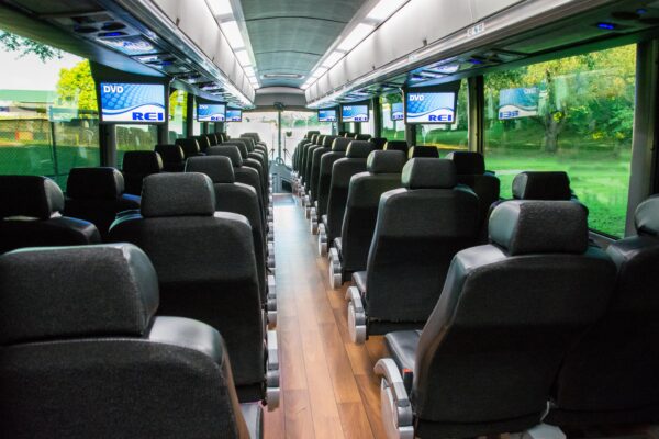 56 Passenger Luxury Bus With Restroom Onboard And Very Comfortable Seats. TV Monitors. 