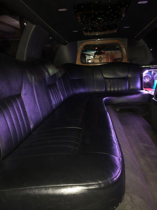Inside Black Lincoln Stretch Limo Seats 8-10 Passengers.