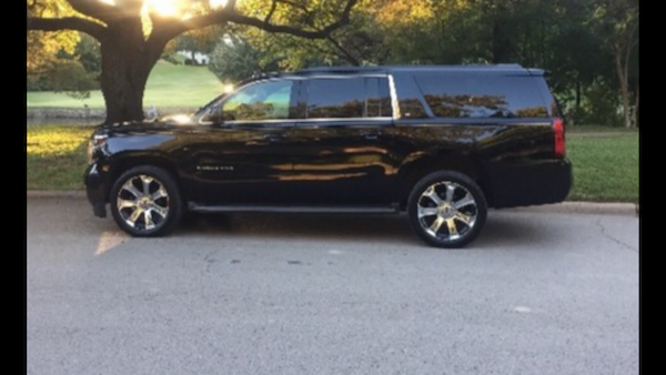 The Statler Dallas, Curio Collection By Hilton To AT&T Stadium Black SUV.